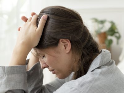 Woman suffering from migraine and headache