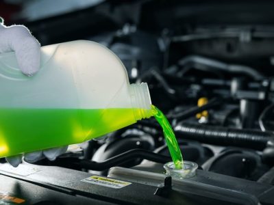 Pouring,Antifreeze,Coolant,Liquid,Into,Car,Engine,Radiator